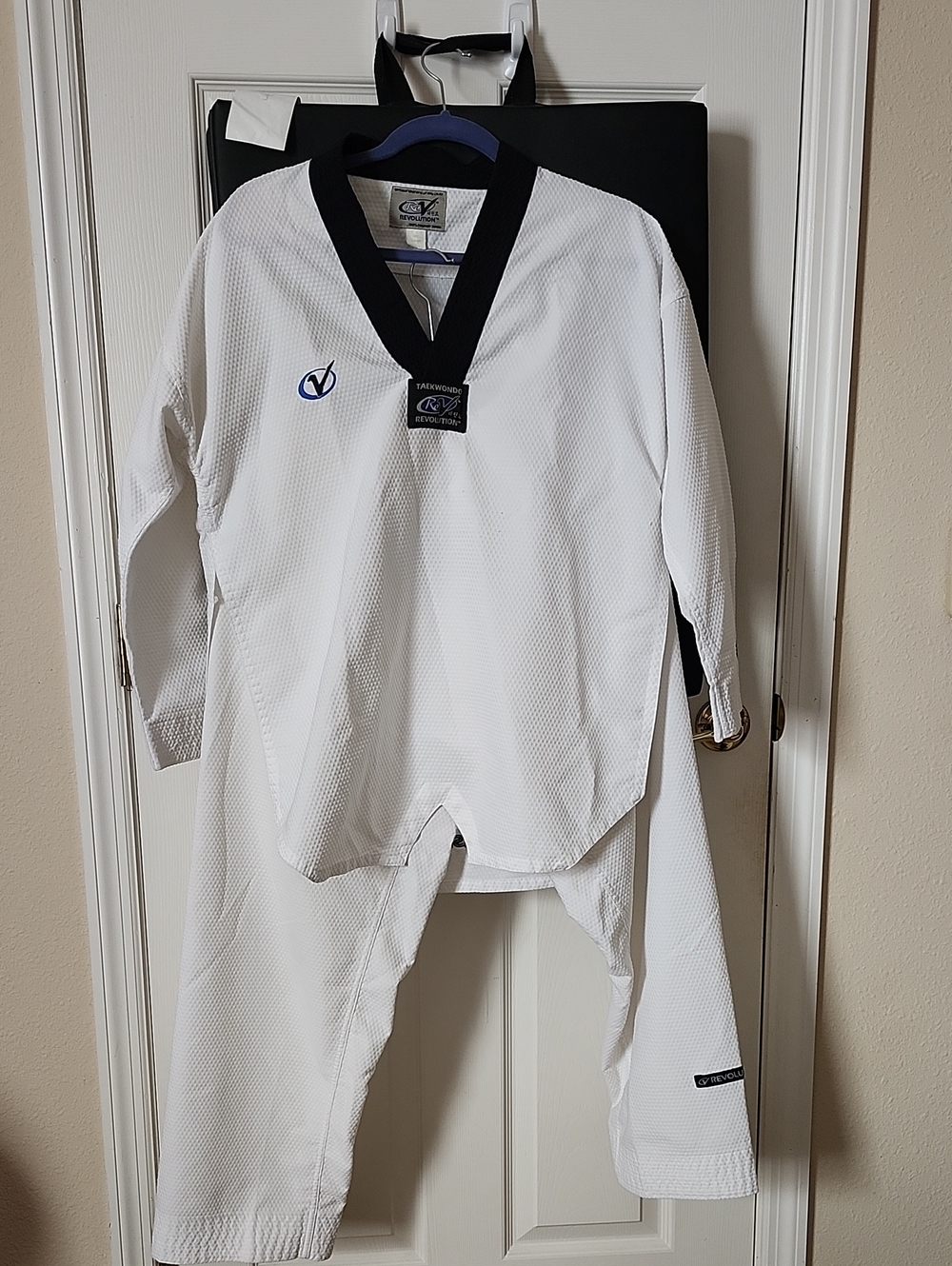 Revolution White Dobok with Black V-Neck and Blue Logo